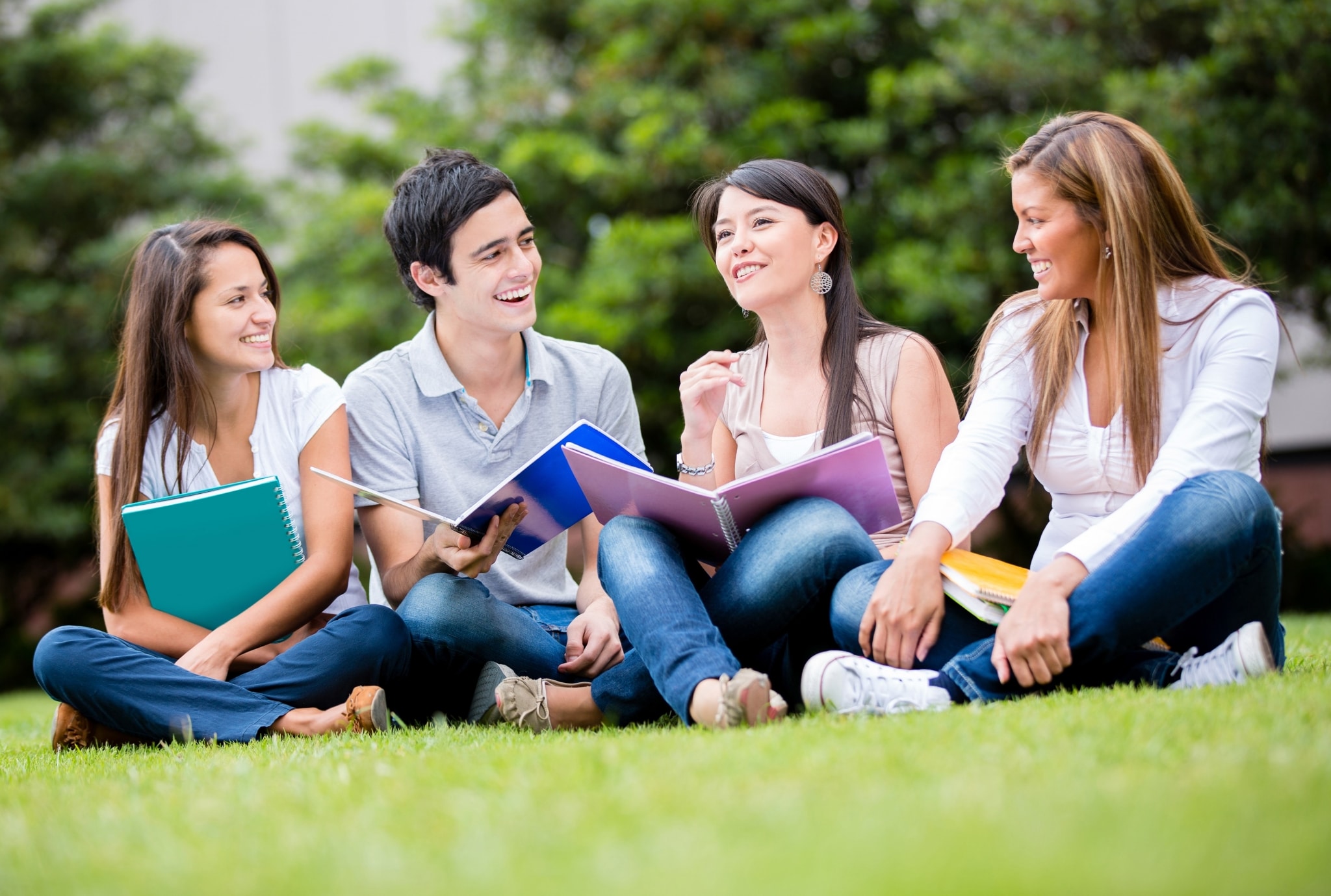 Happy group of students outside