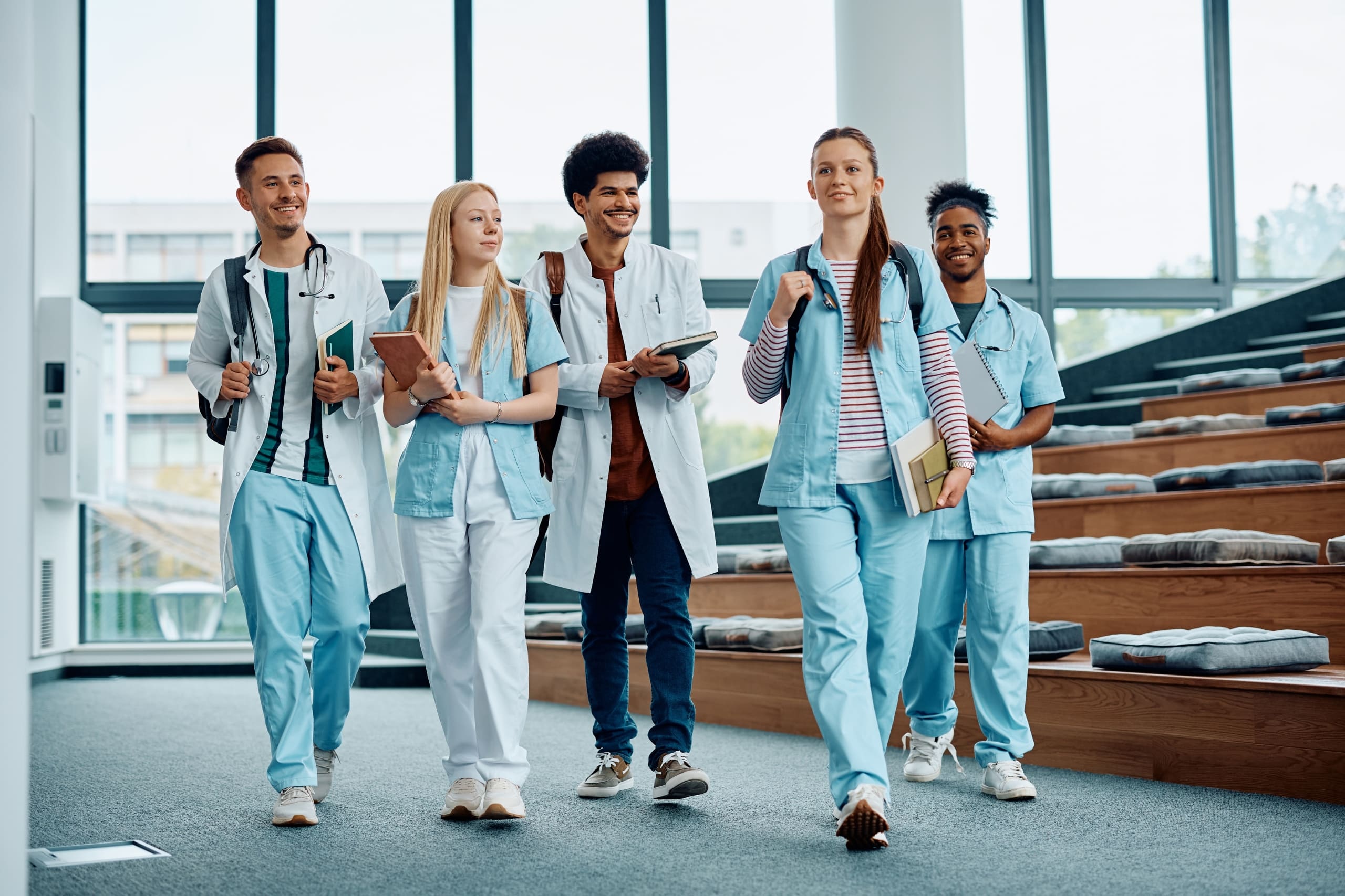 Group of medical and nursing students leaving a lecture