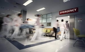 Blurred medical professionals in an emergency room